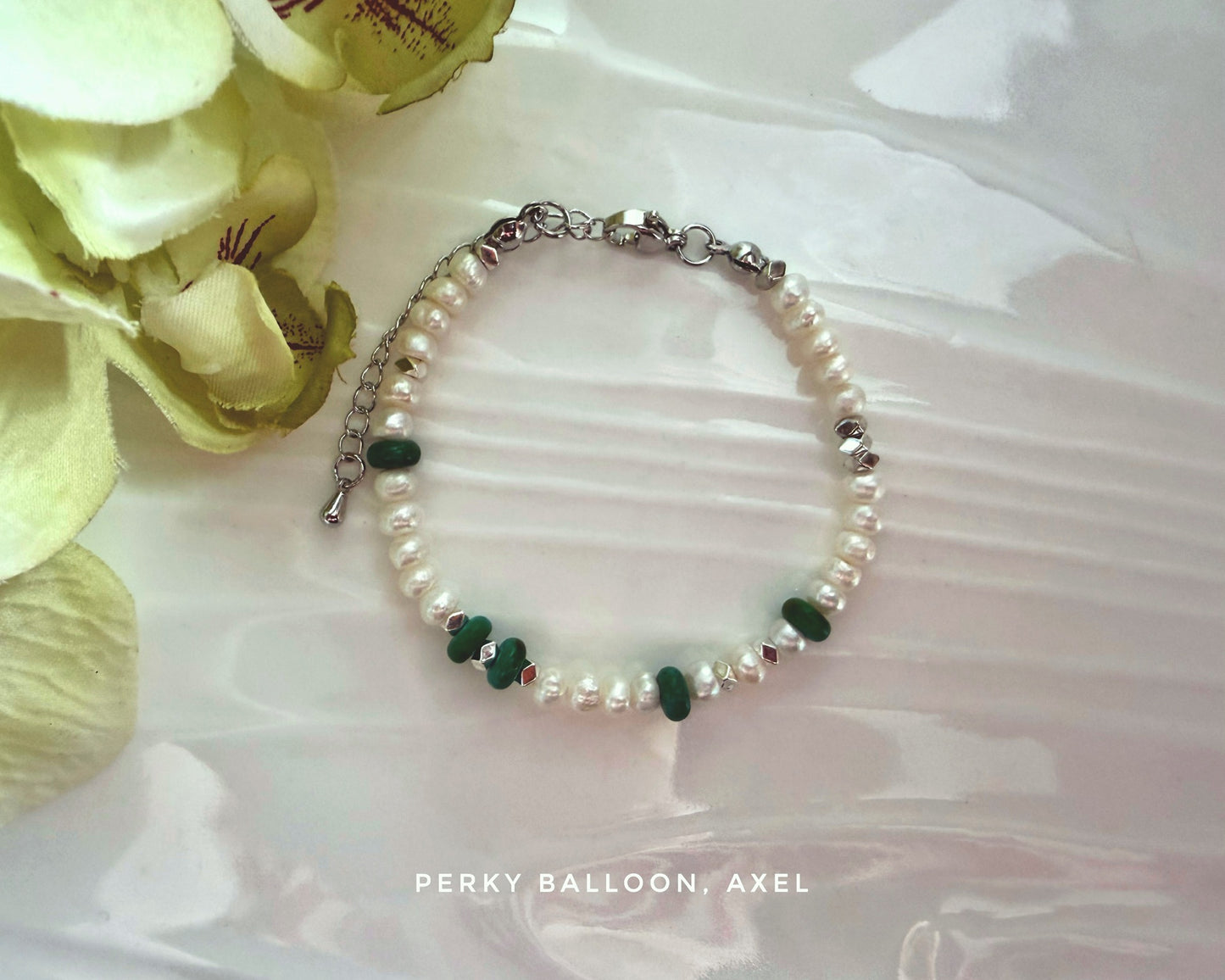 Axel bracelet necklace