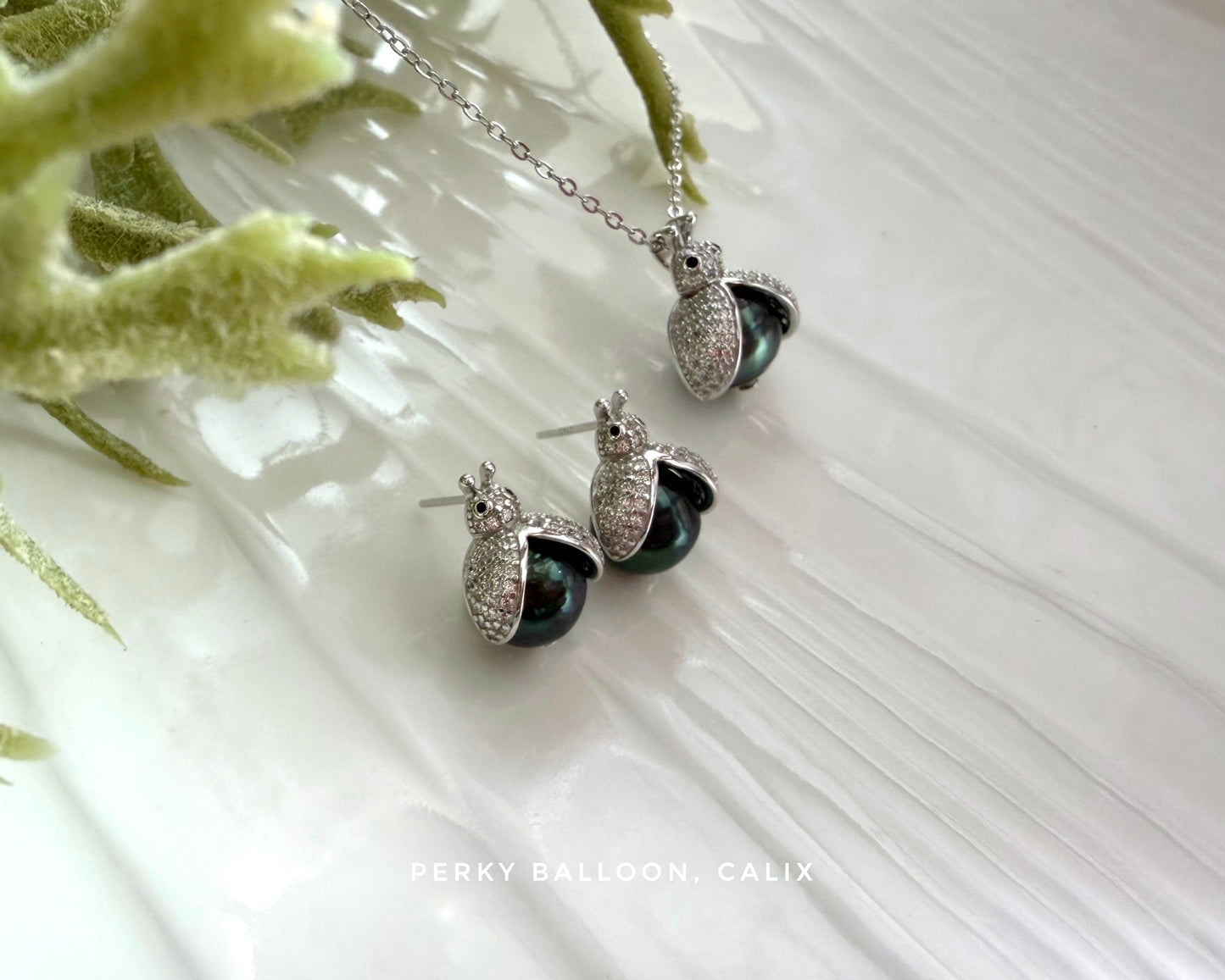Calix earrings necklace