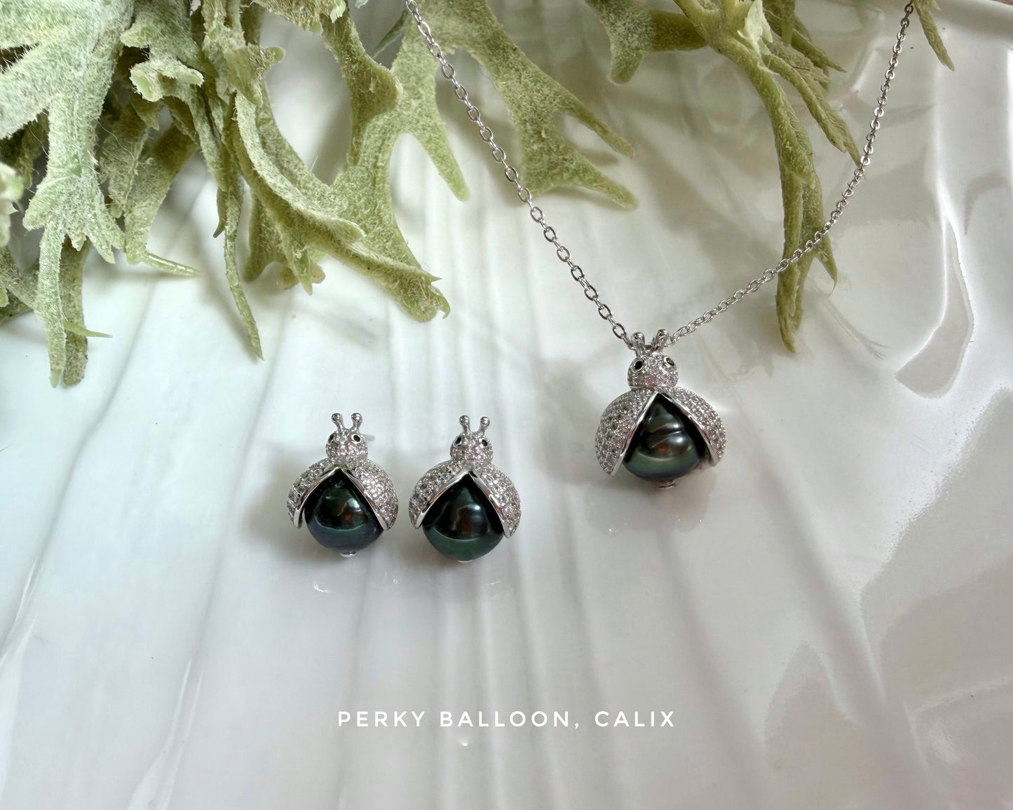 Calix earrings necklace
