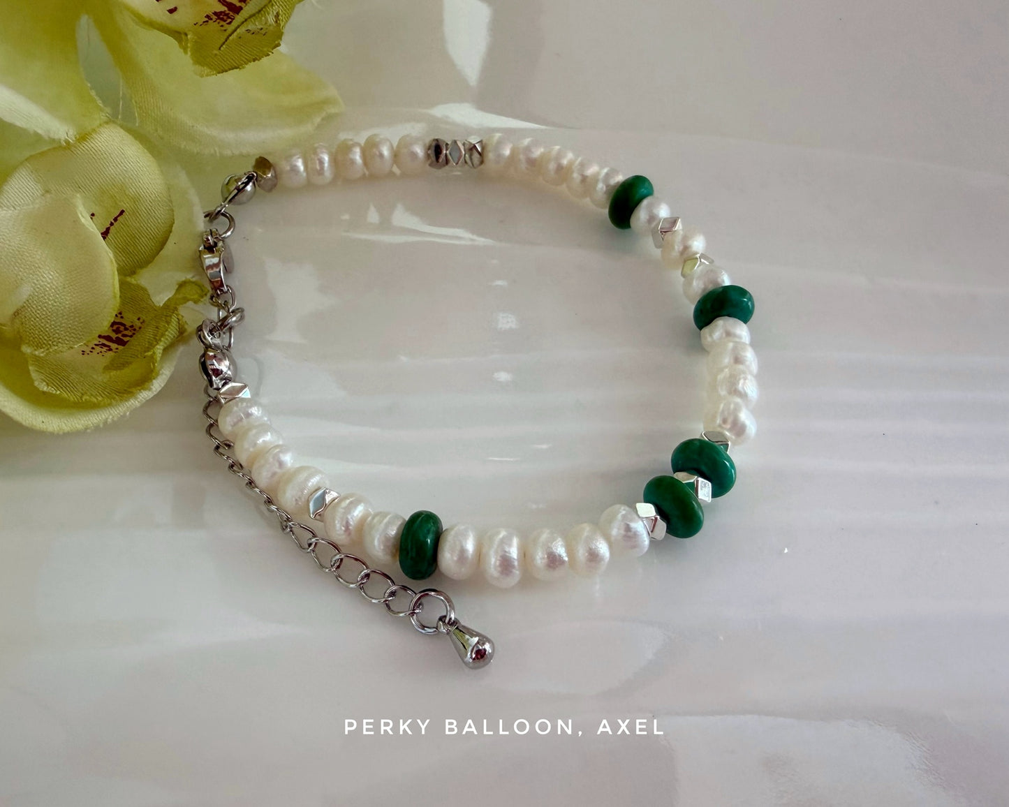 Axel bracelet necklace