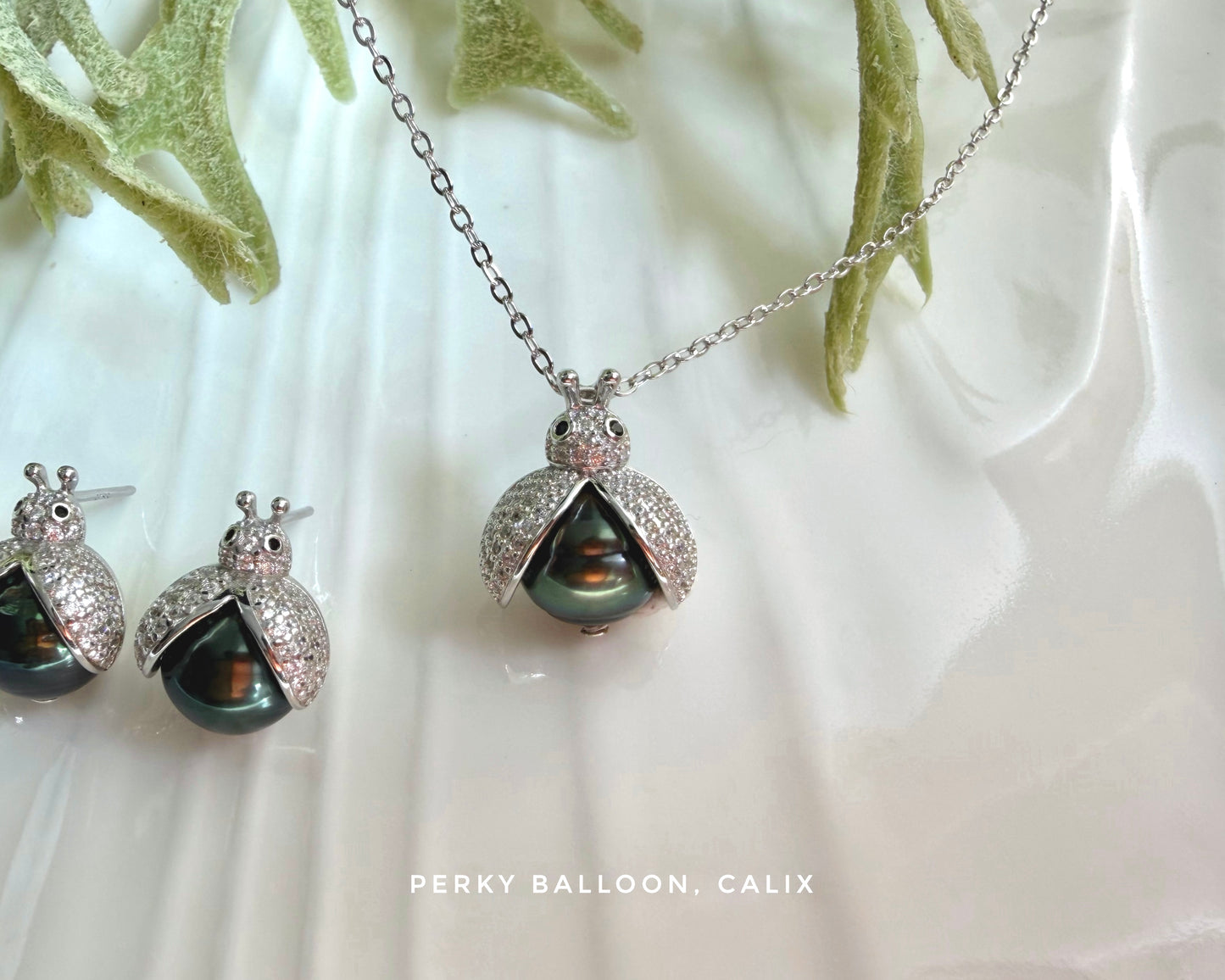 Calix earrings necklace