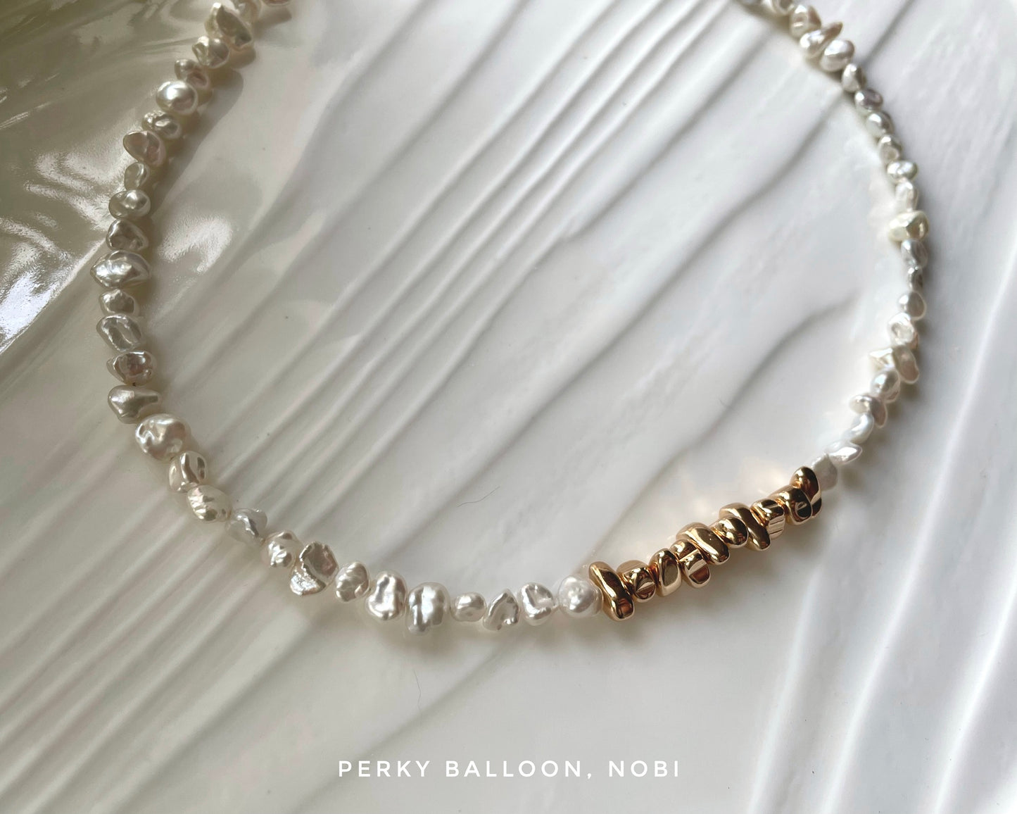 Nobi bracelet necklace